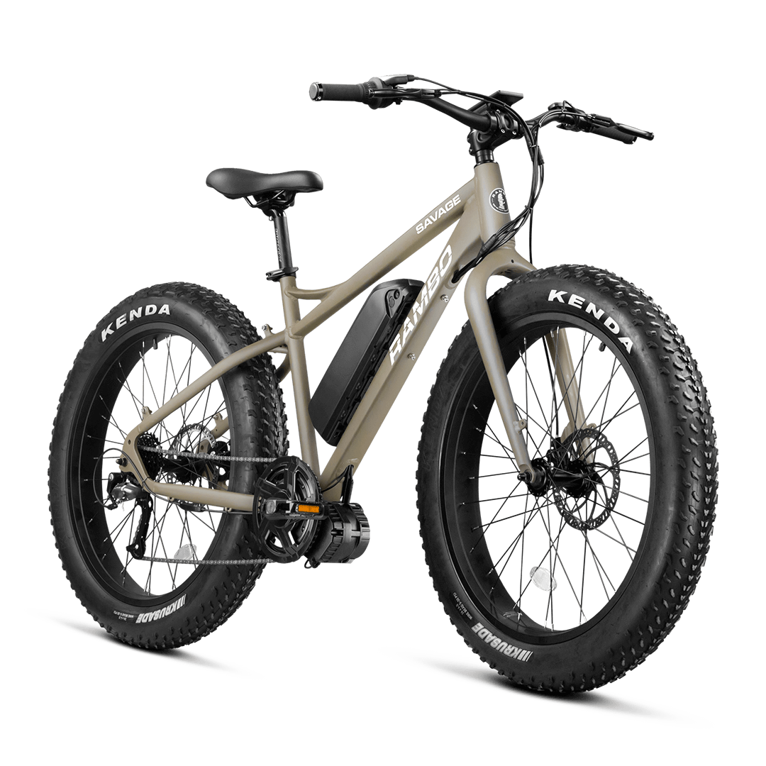 A frontal/side view of The Savage ebike in a flat dark earth colour (tan/brown).